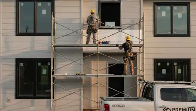 Skylight installation on vinyl siding roof by Buffalo NY exterior contractors